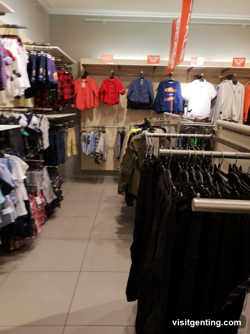 Clothing store aisle with sale signs