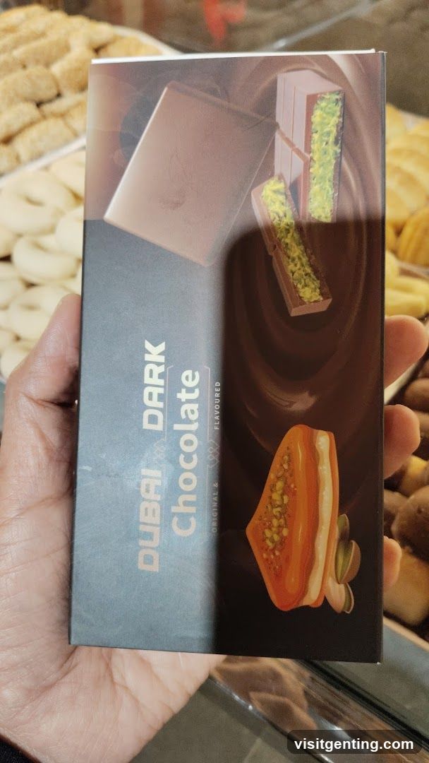 Hand holding chocolate bar