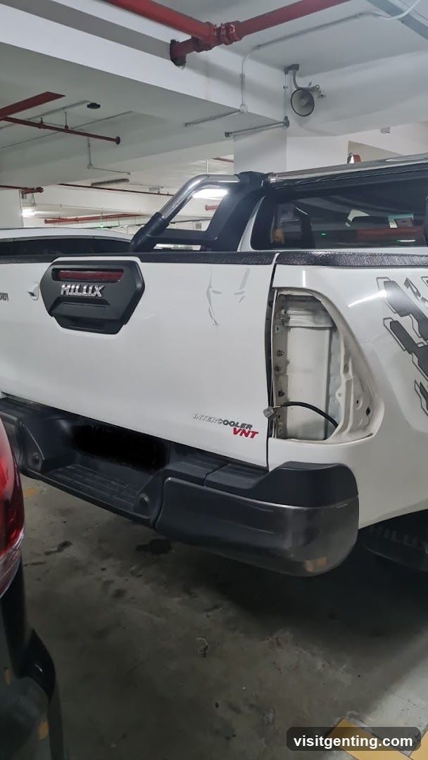White pickup truck in parking garage