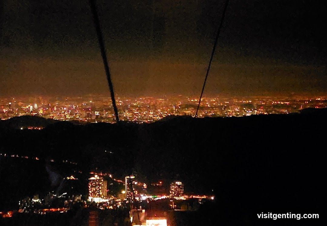 Nighttime cityscape from cable car