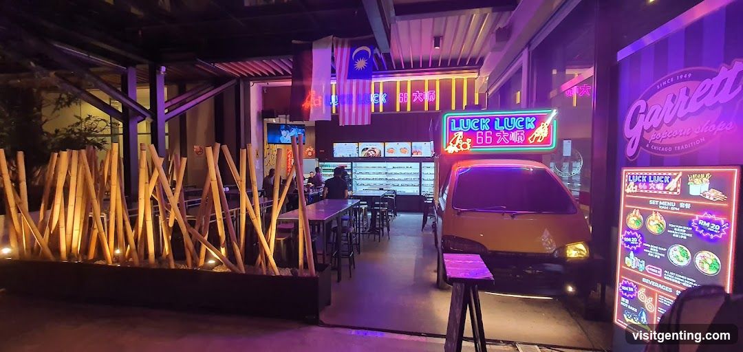 Interior of a neon-lit restaurant with themed decor