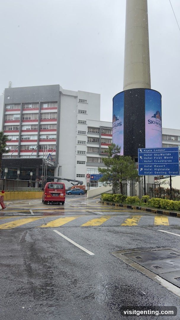 Outdoor View of Hotel Complex with Directional Signage