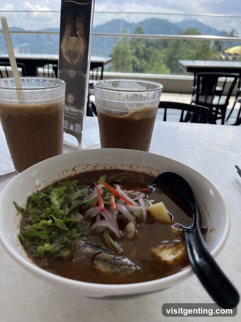 Table with food and drinks overlooking mountains