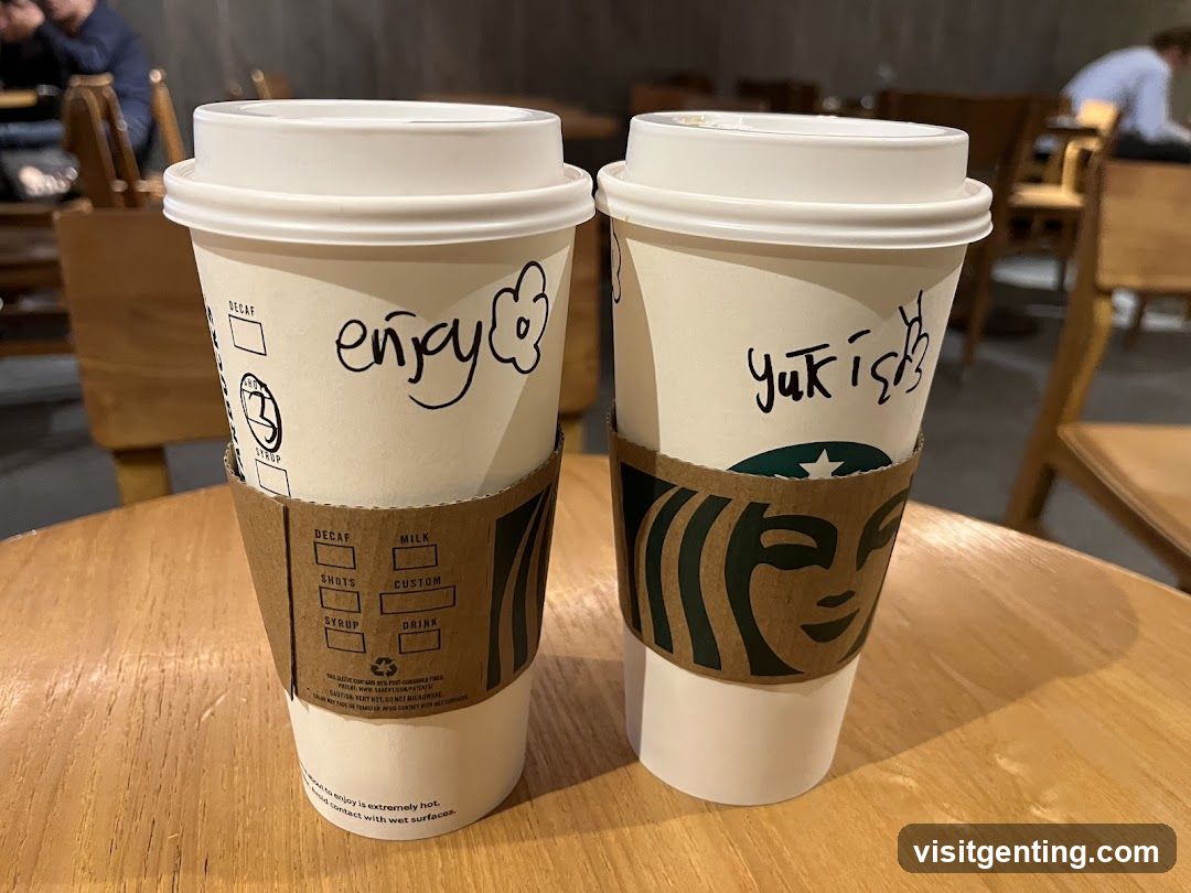 Two Starbucks Coffee Cups