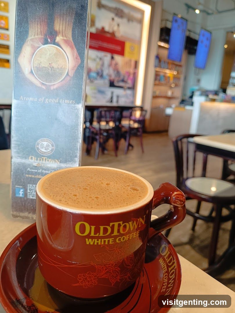 OldTown White Coffee Cup and Promotional Stand