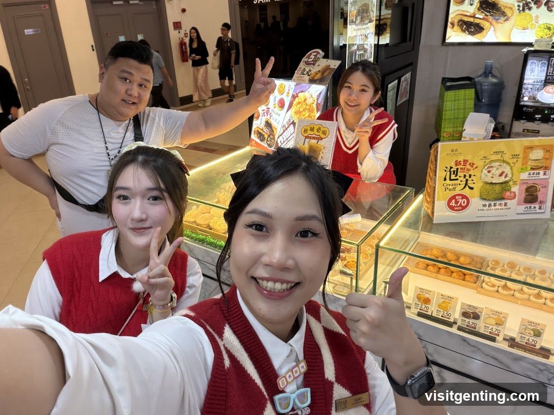 Group selfie at bakery counter