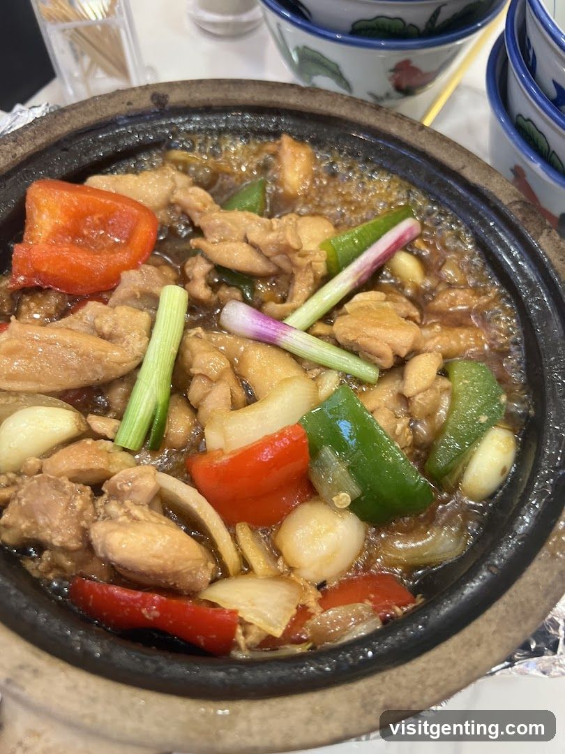 Stir-fried chicken dish in clay pot