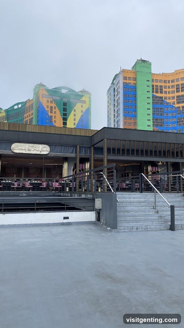 Outdoor terrace area with colorful buildings in background