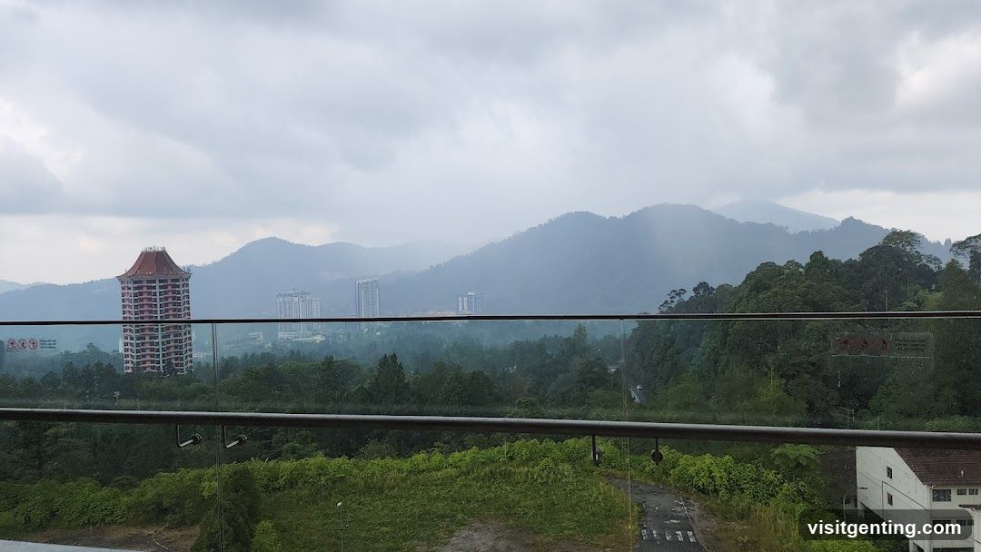 Balcony View with Mountains and Urban Landscape