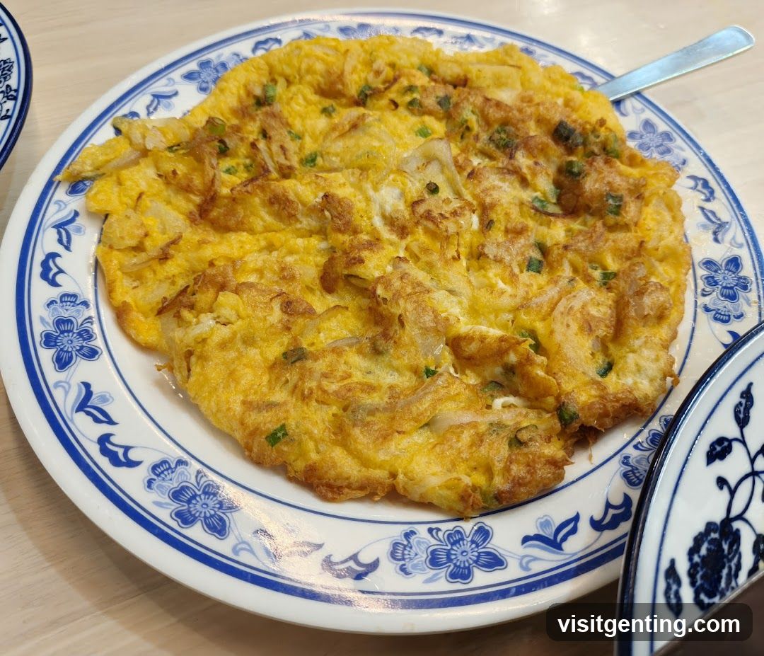 Fried Egg Dish on Blue and White Plate