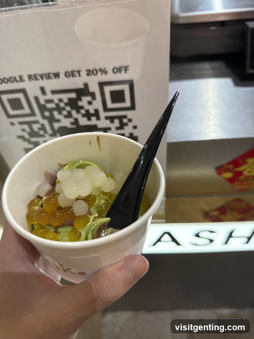Hand holding dessert cup