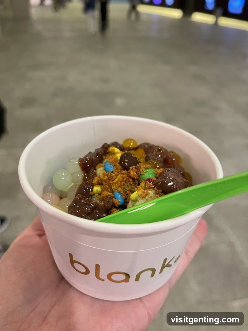 Hand holding dessert cup
