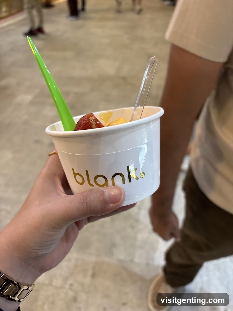 Hand holding dessert cup