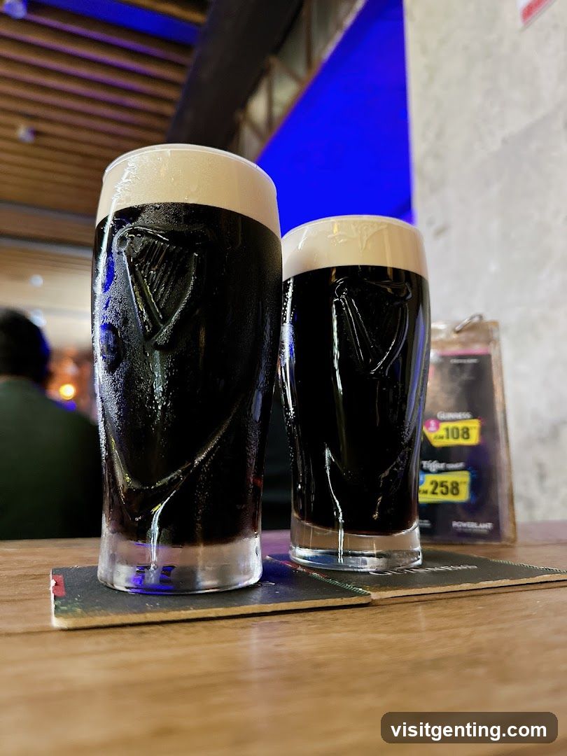 Two Guinness beers on coaster