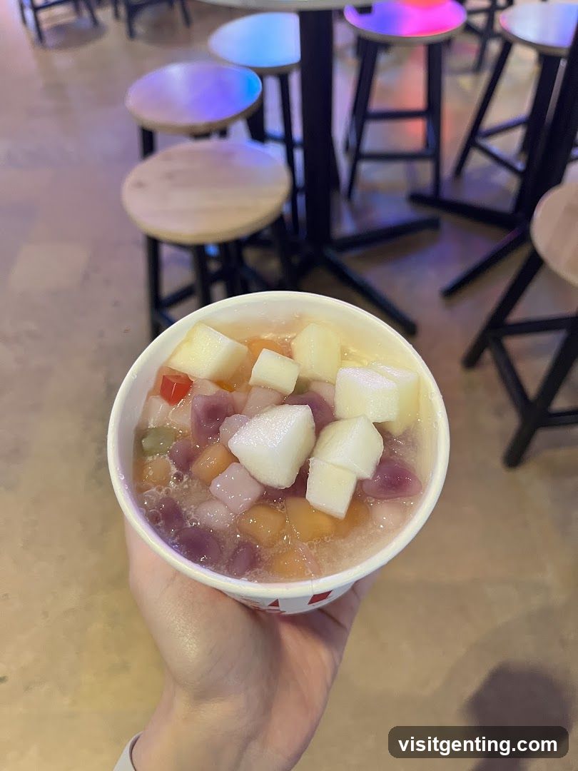 Hand holding dessert cup