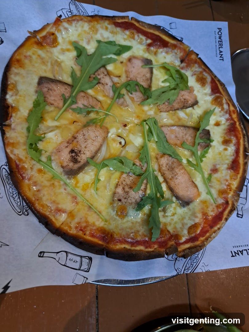 Pizza with salmon and arugula