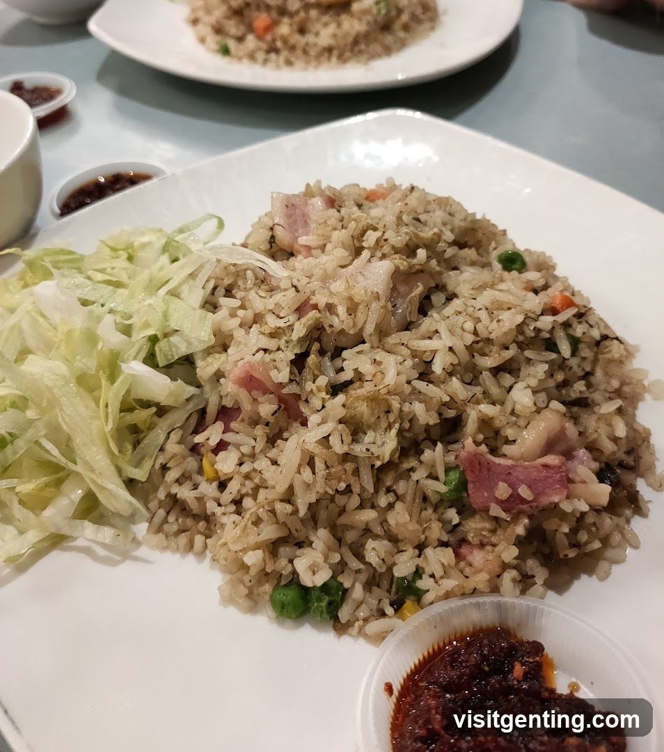 Fried Rice Dish with Side Salad and Sauce