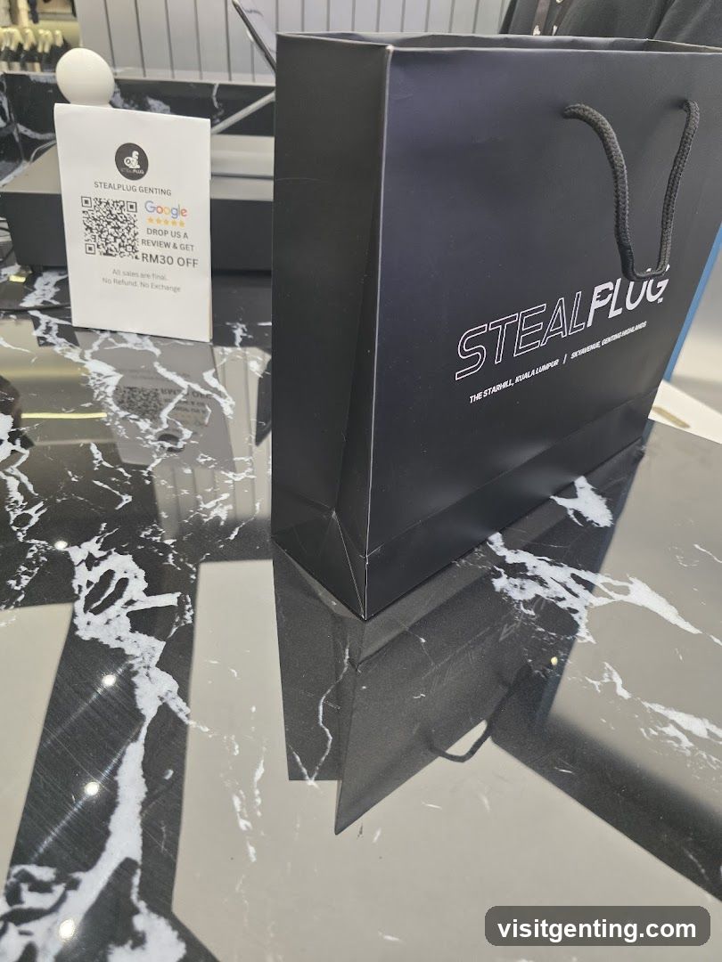 StealPlug Shopping Bag and Promotional Sign