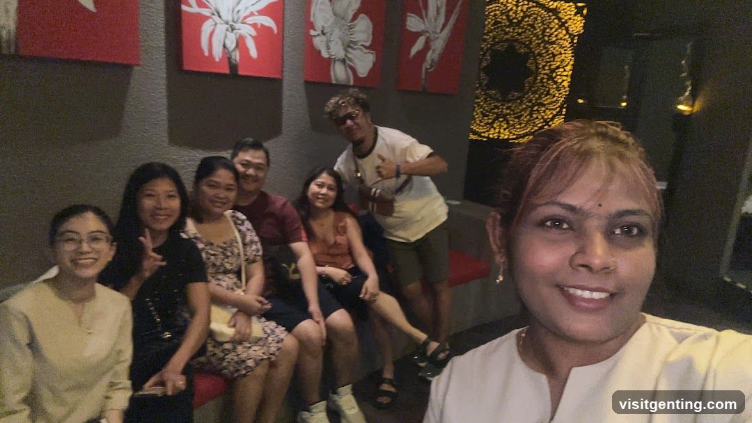 Group selfie in indoor setting