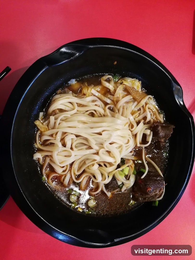 Noodle Dish in Black Bowl