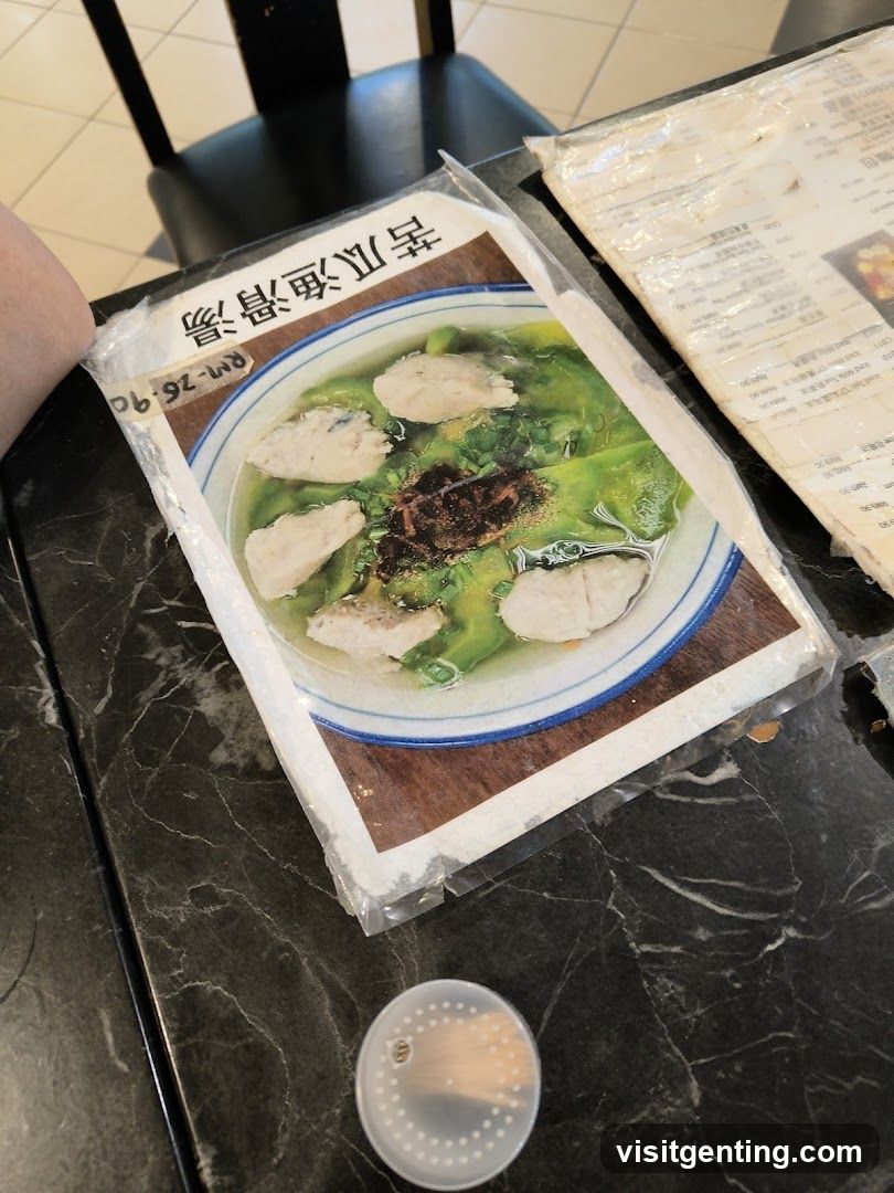 Tabletop with packaged food item and menu
