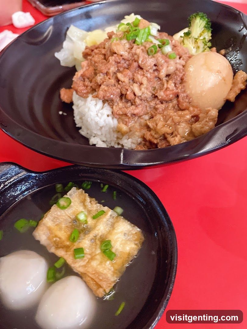 Food served in black bowls on red table