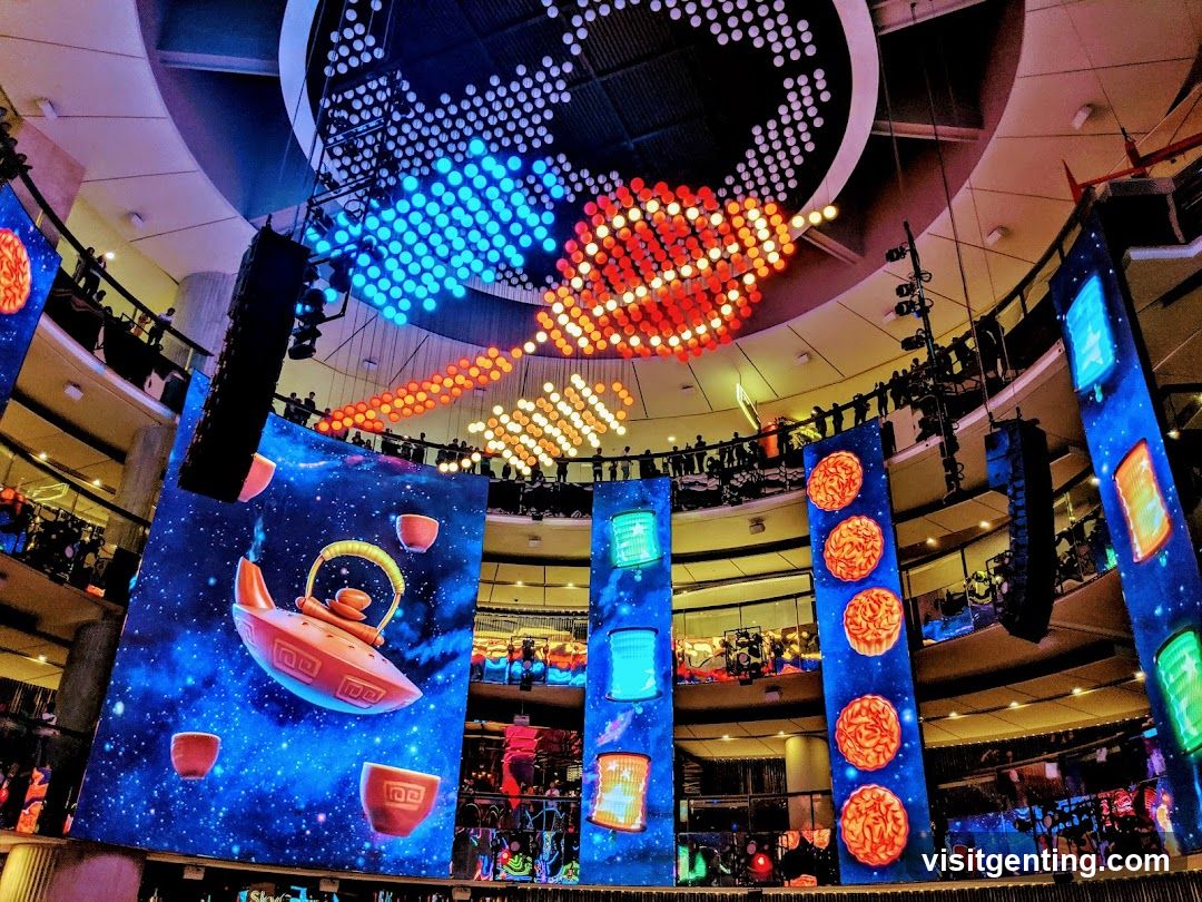 Interior of multi-level venue with digital displays
