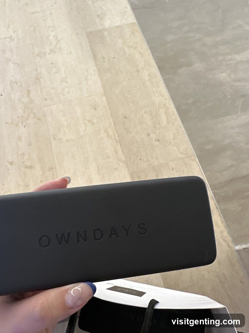 Hand holding branded case