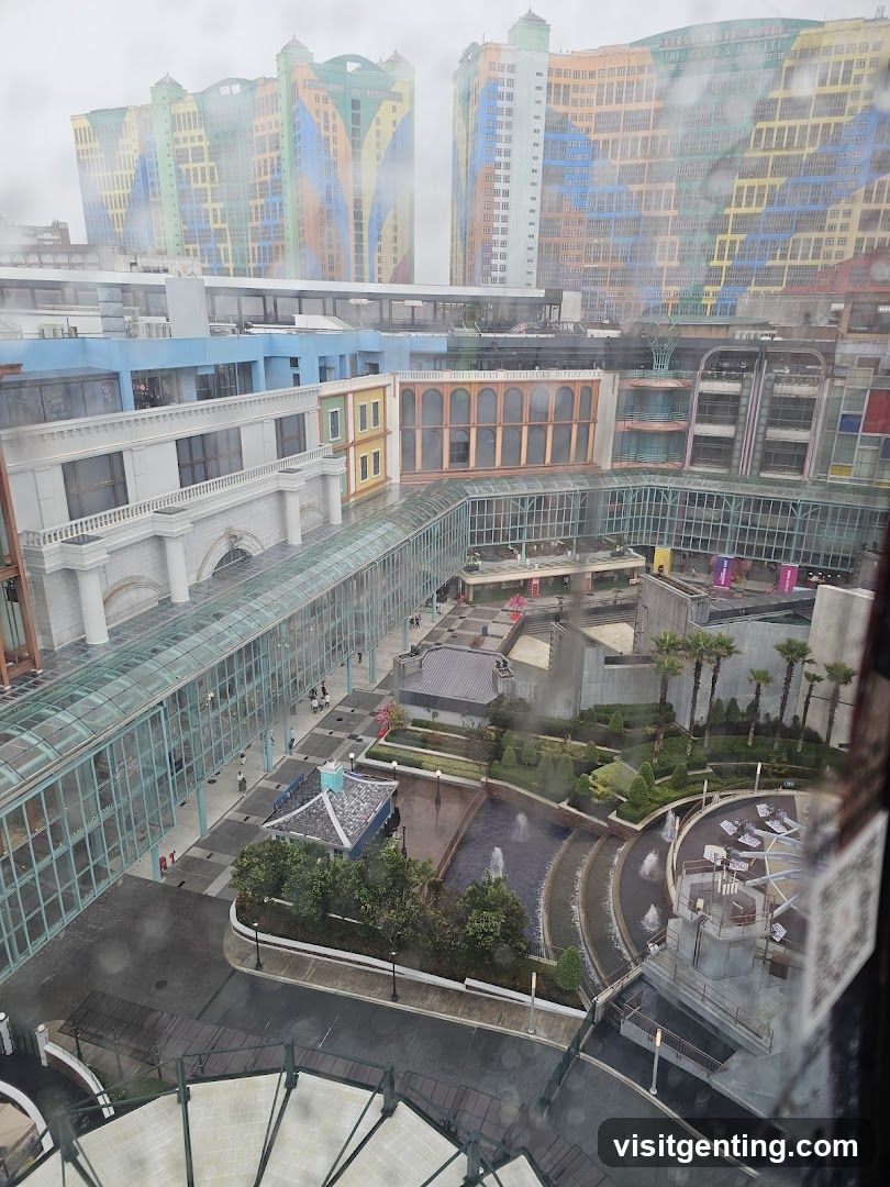 View from elevated window overlooking shopping complex