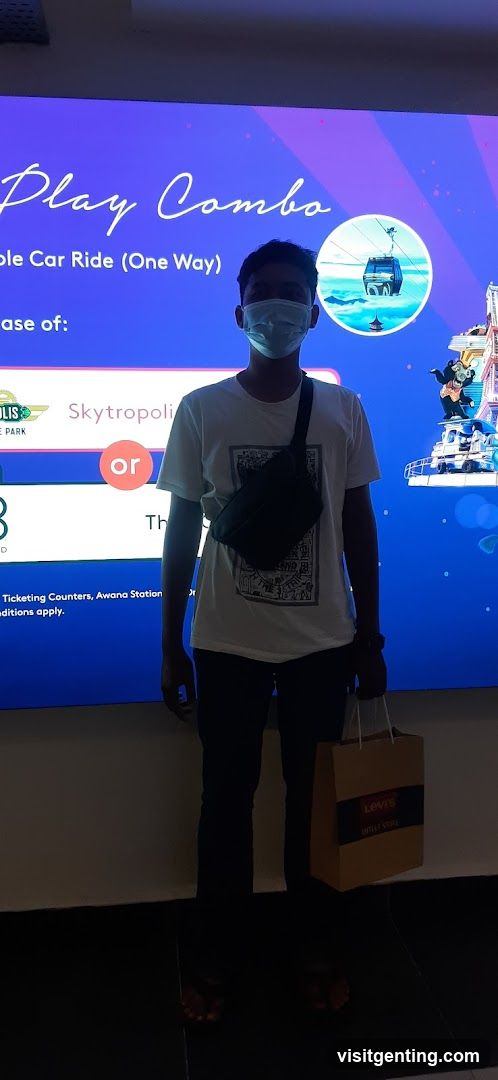 Person standing in front of promotional display