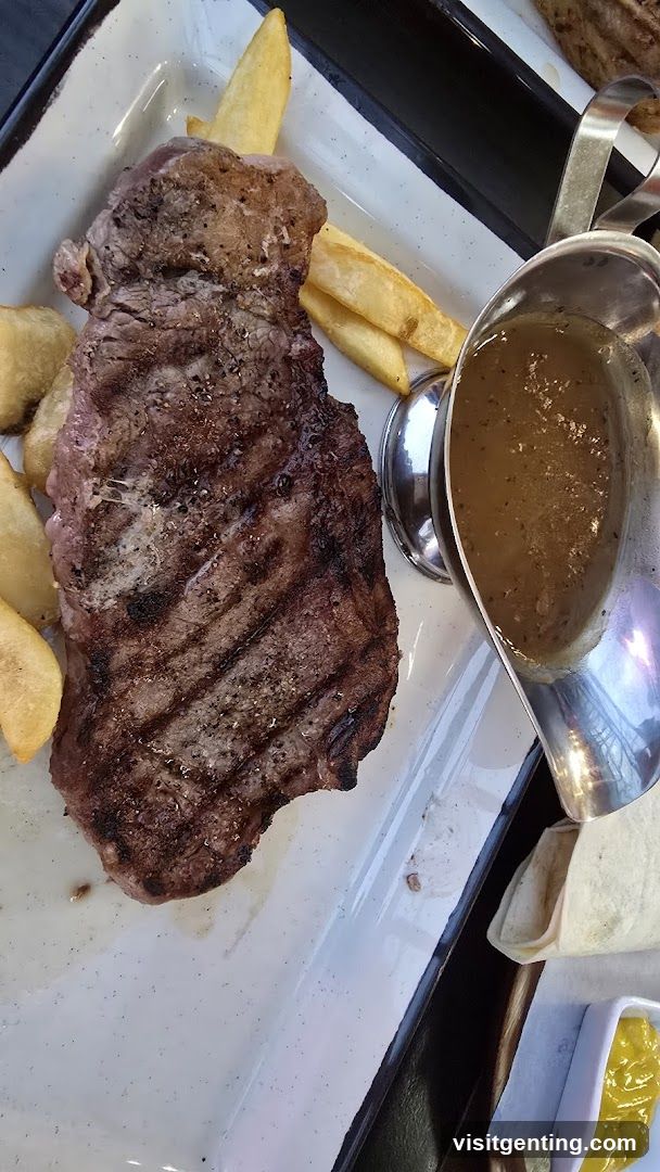 Grilled steak with fries and gravy