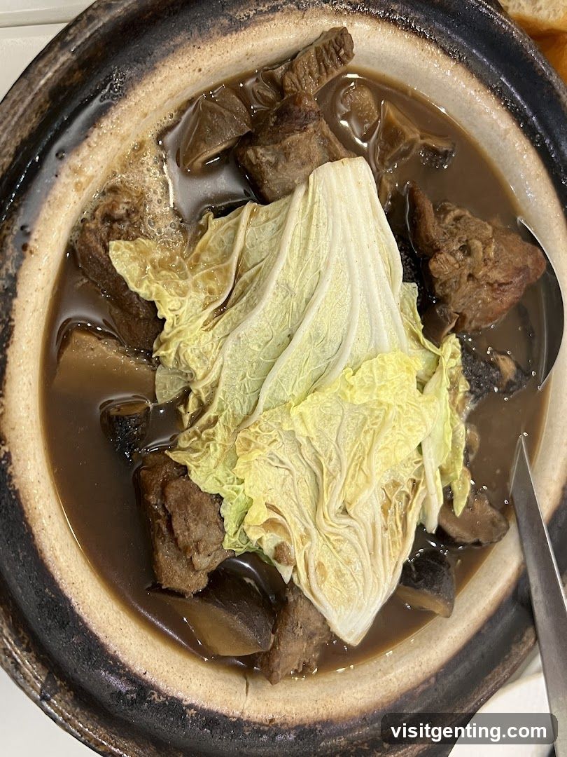 Stewed meat and cabbage in clay pot
