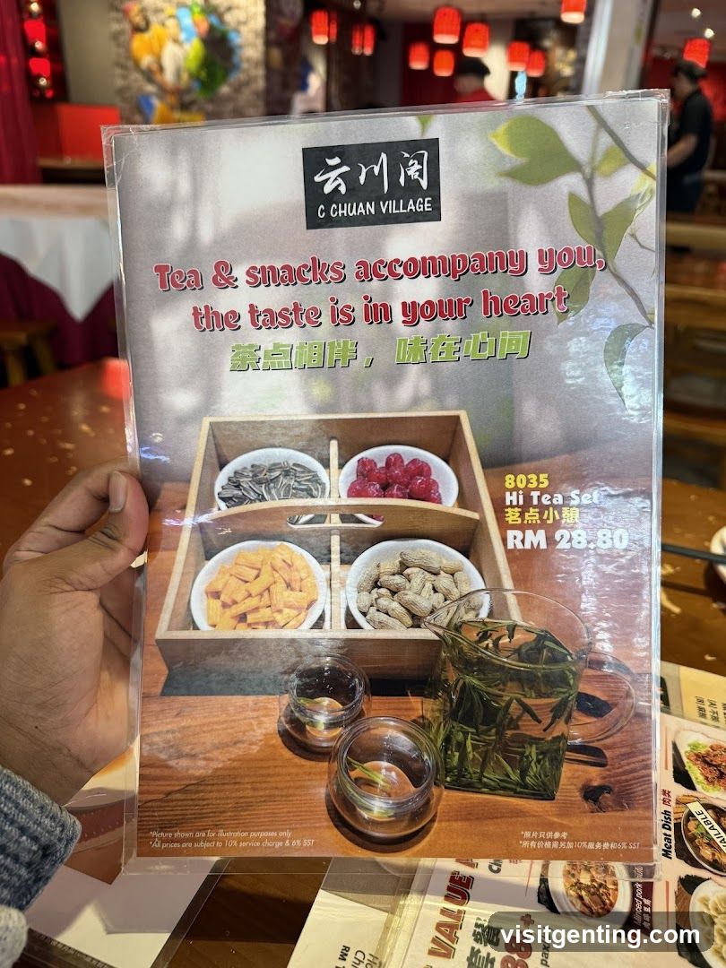 Hand holding printed menu at C Chuan Village
