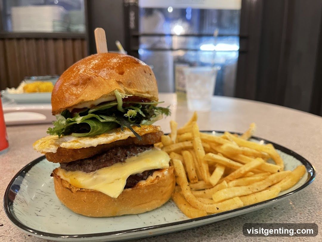 Burger and fries on plate