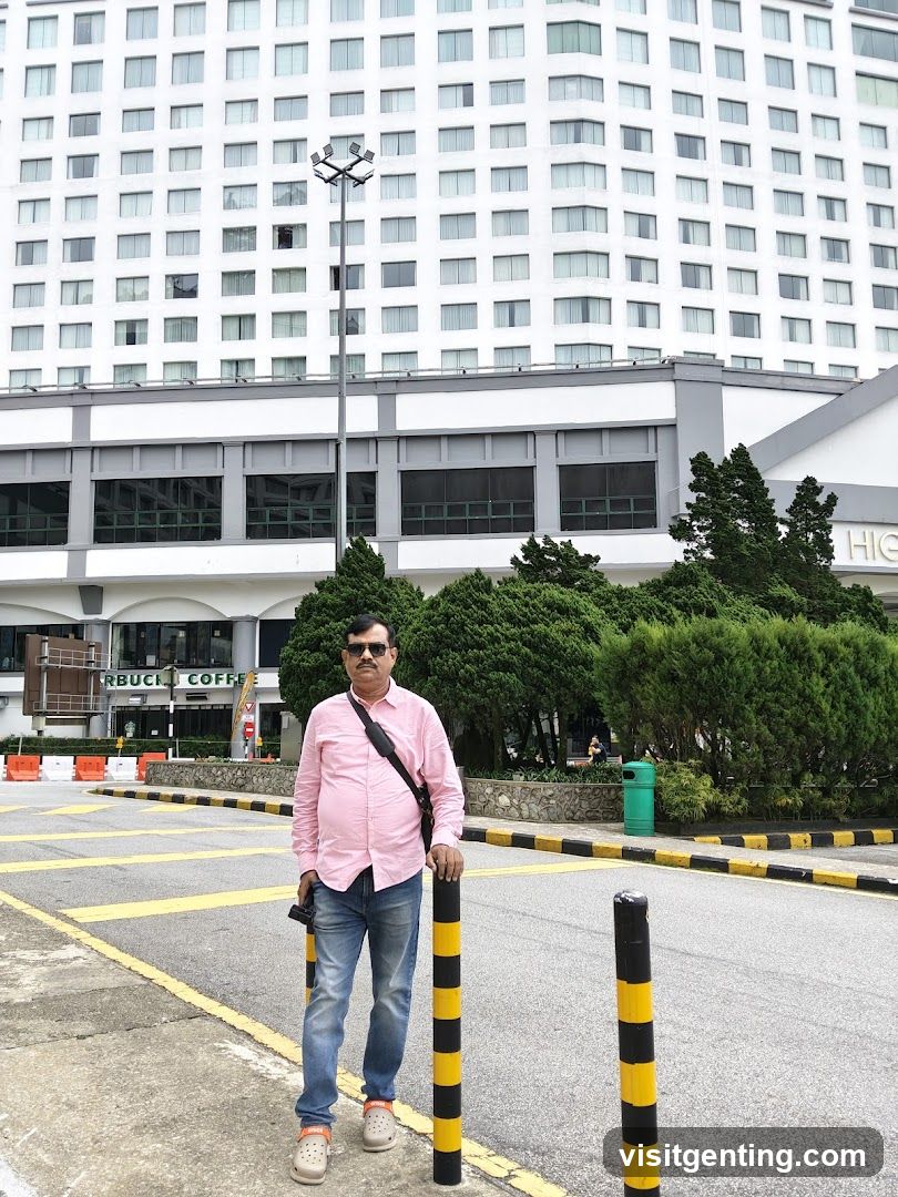 Man standing in front of a large building