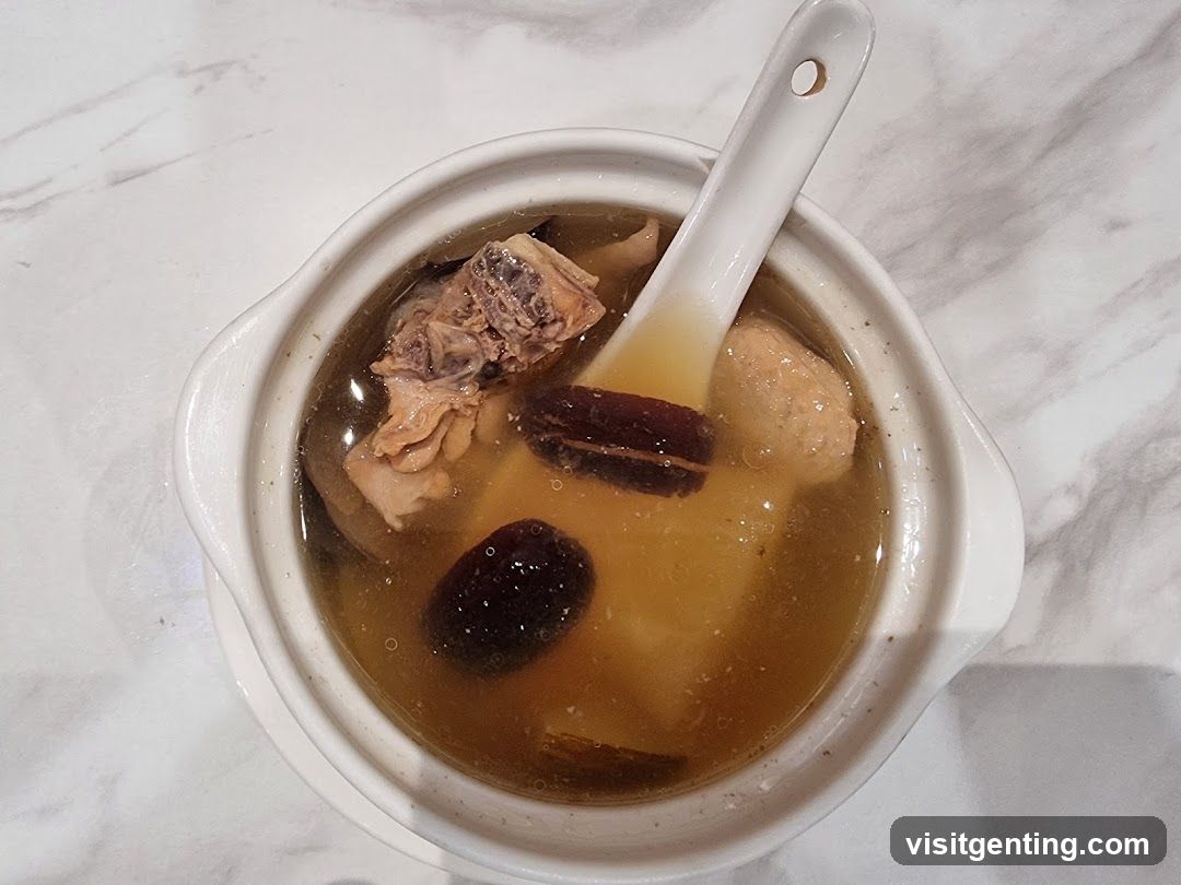 Soup in ceramic bowl with spoon