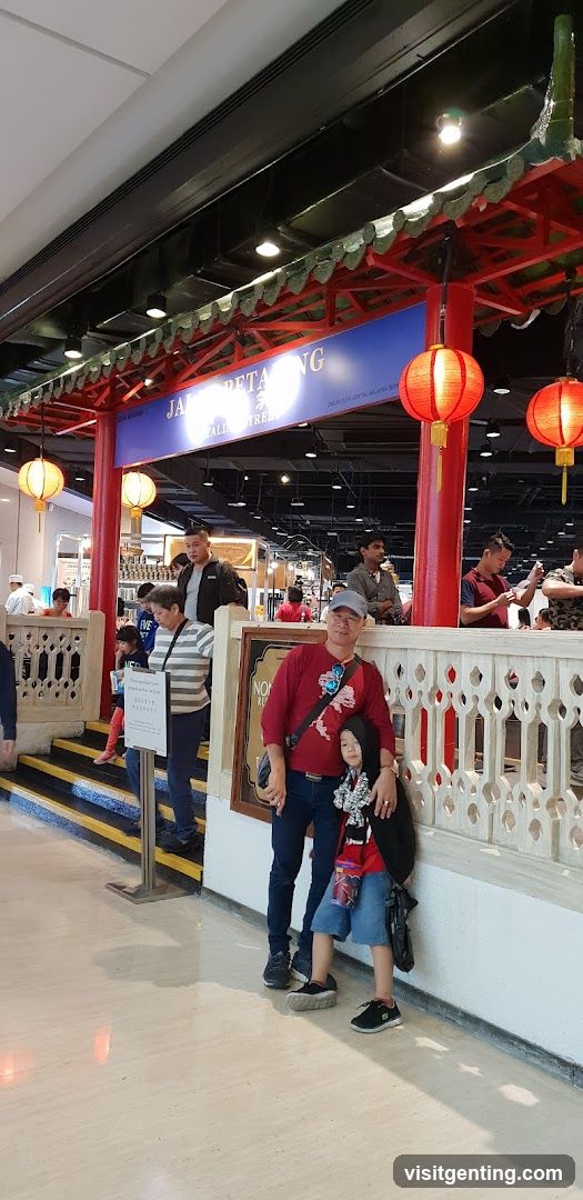 Interior of shopping mall with Chinese-themed storefront