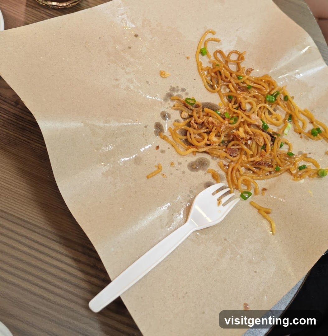 Noodles on paper with fork