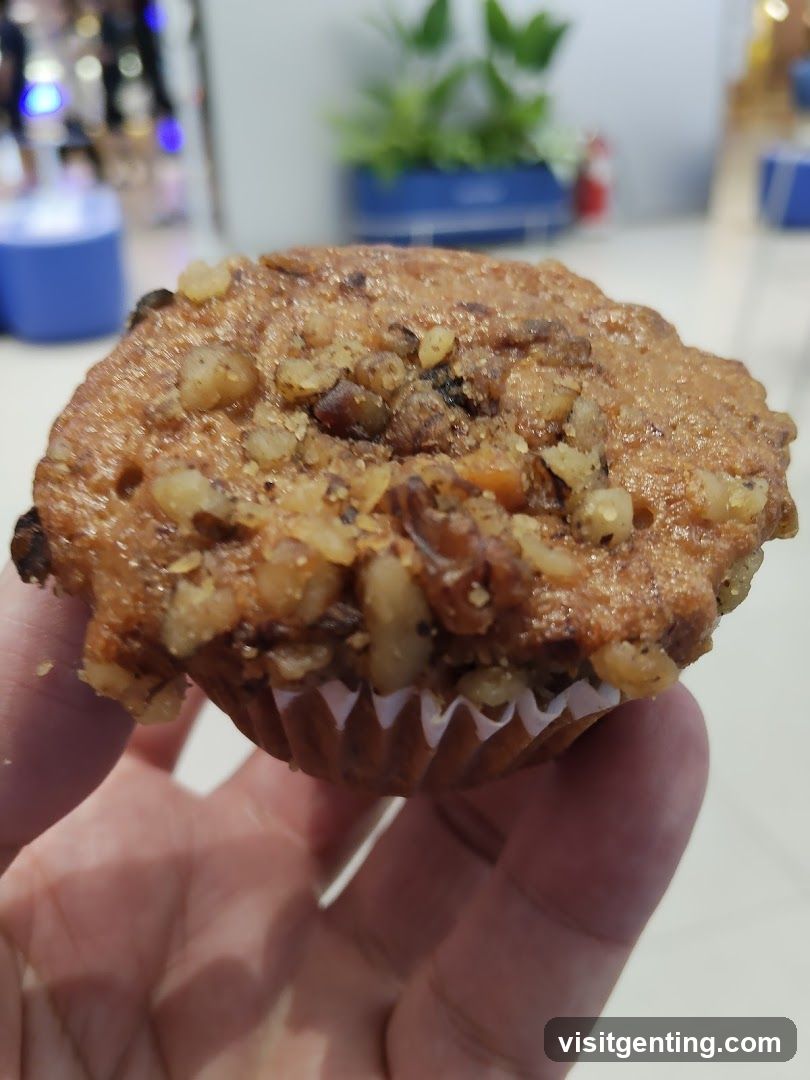 Hand Holding Muffin