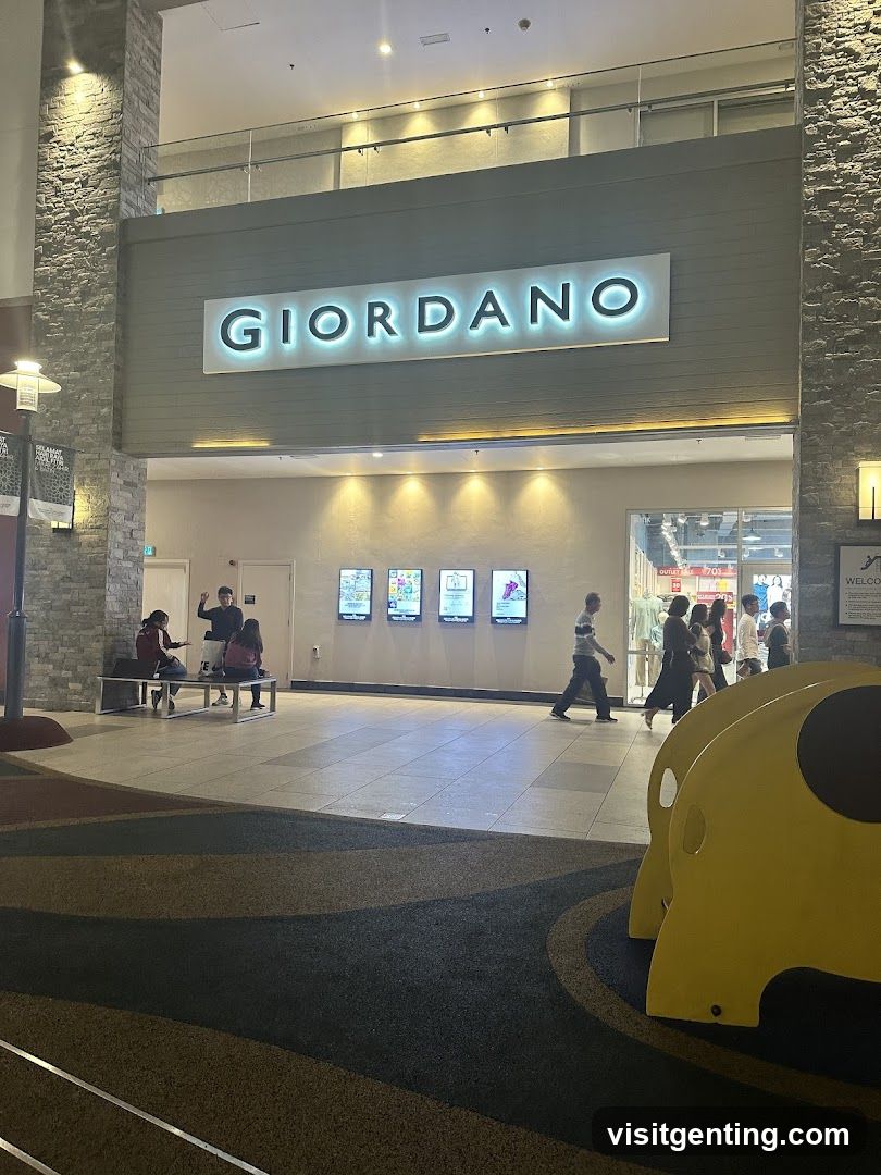 Interior of shopping mall with Giordano storefront