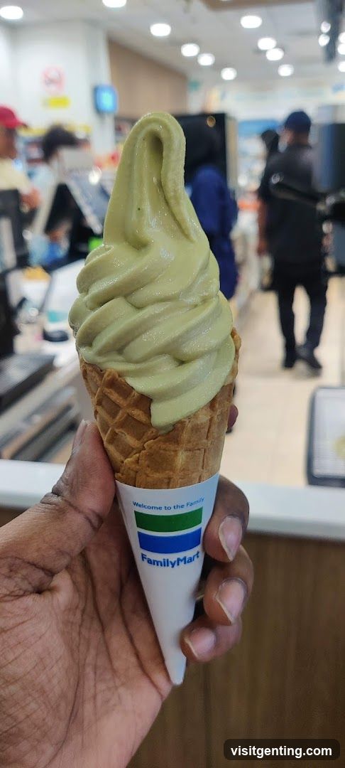 Hand holding ice cream cone