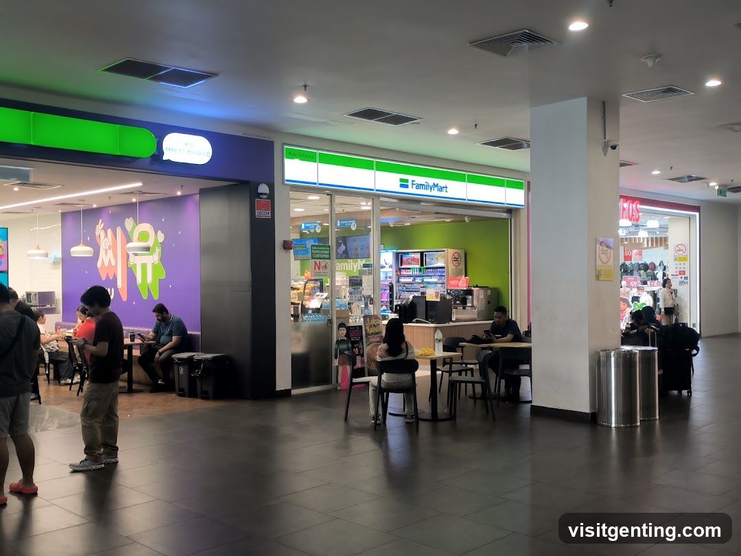 Interior of shopping mall with convenience store and dining area