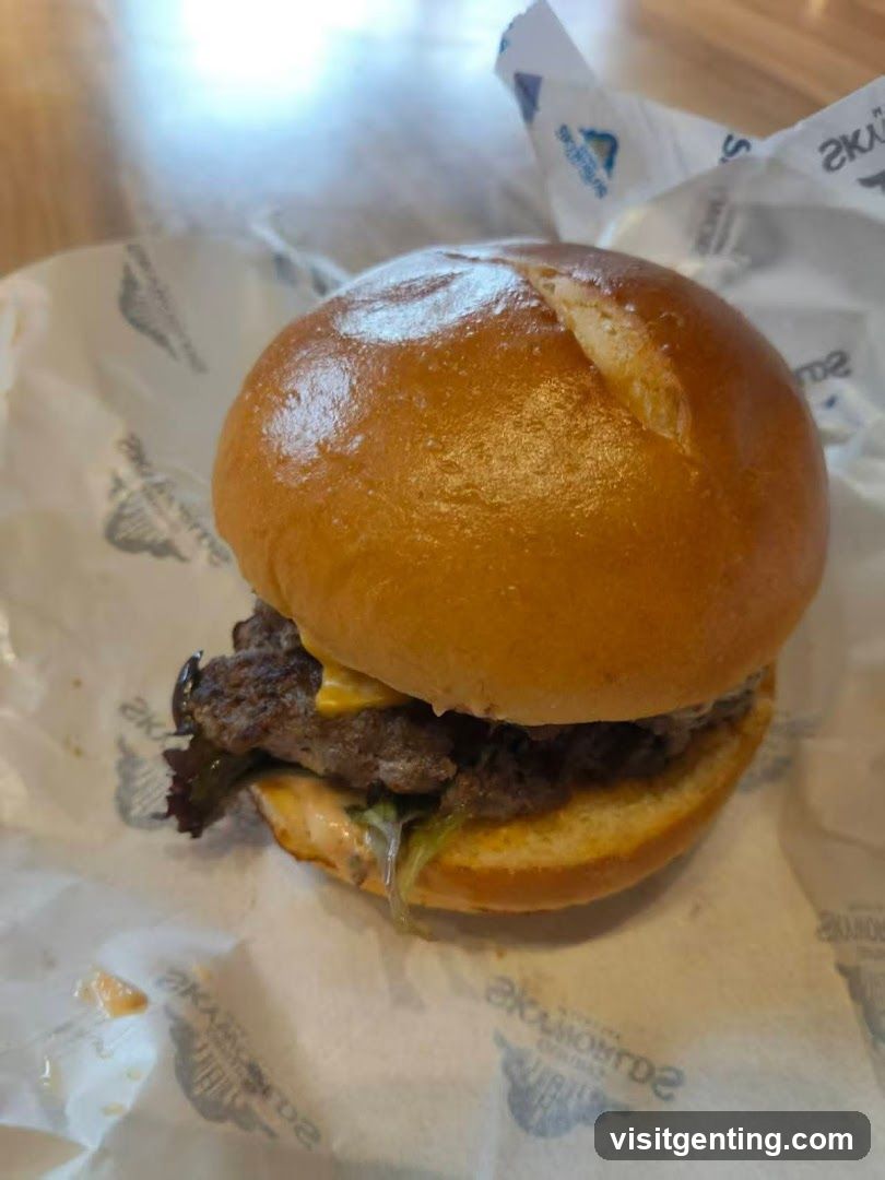 Burger on branded paper