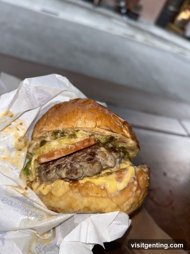 Burger held in hand