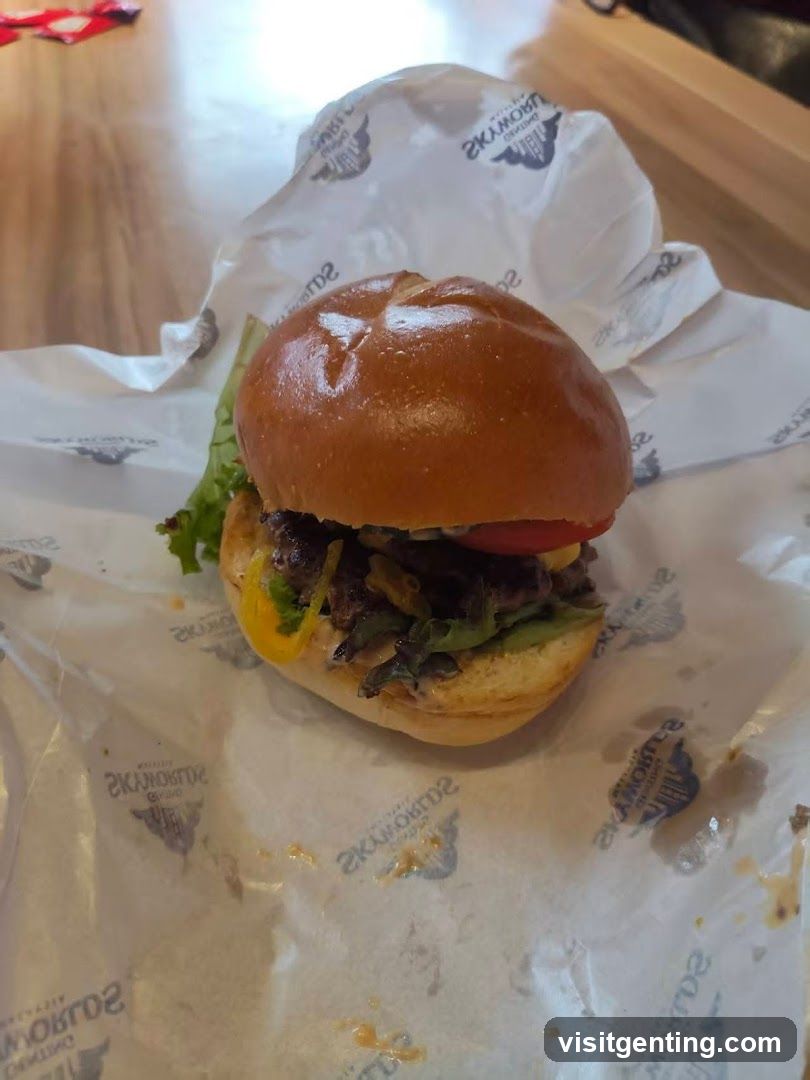 Burger on branded paper