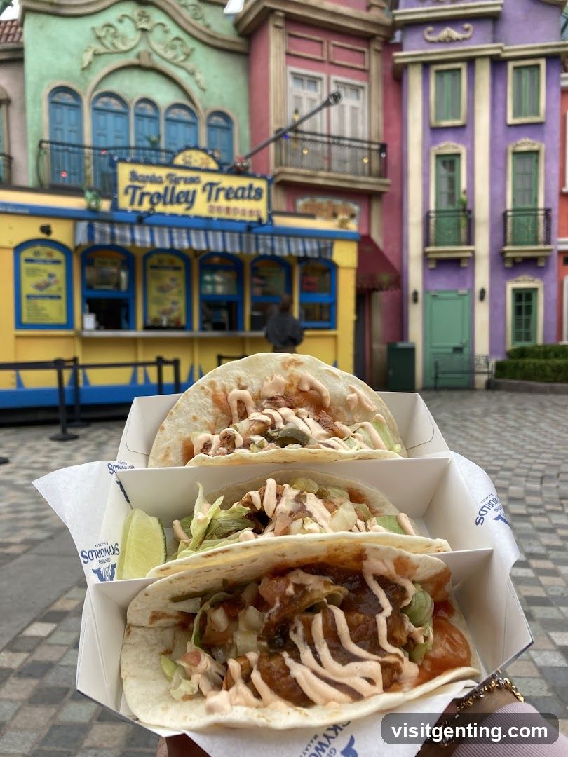 Tacos in front of colorful buildings
