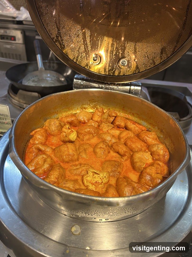 Food in a buffet-style serving pot