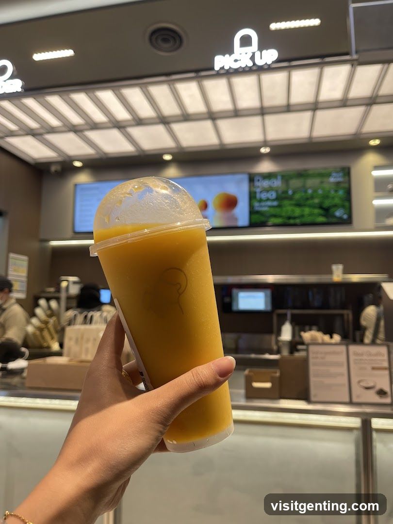Hand holding beverage in store