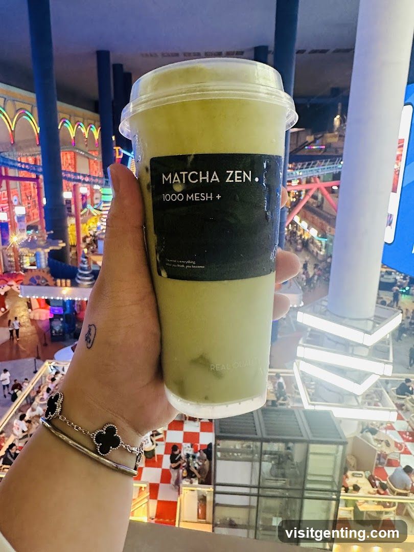 Matcha Zen drink held in hand