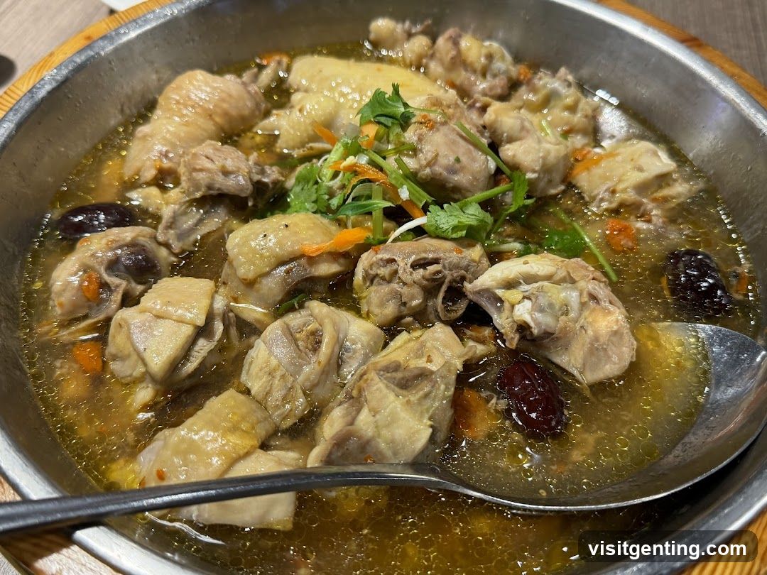 Chicken stew in metal bowl